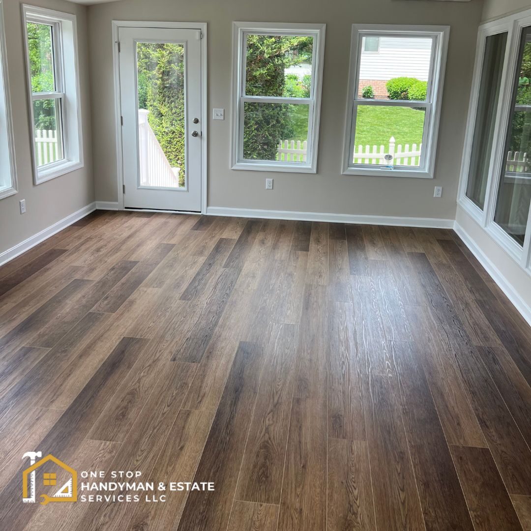 remodeled room a new room with brown wood flooring